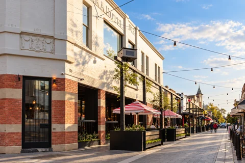 Heritage façades and outdoor dining along Little Malop Street