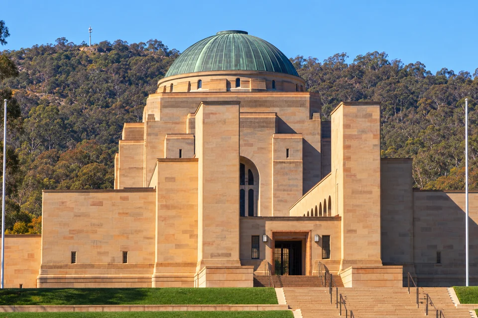 The sandstone facade and copper dome of the Australian War Memorial in Canberra